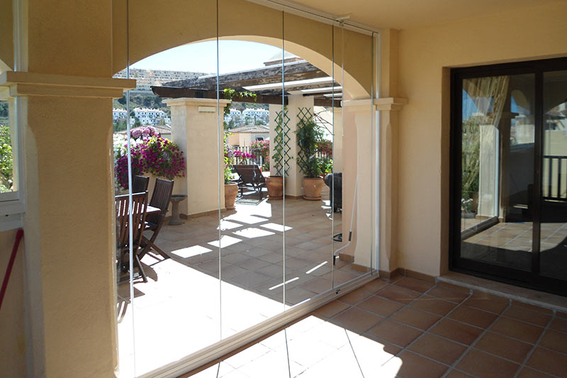 Sun streaming in through conservatory glass